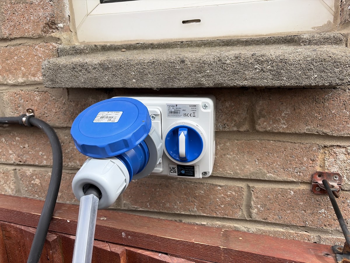Outdoor commando socket and isolator fitted by Bris Electrical